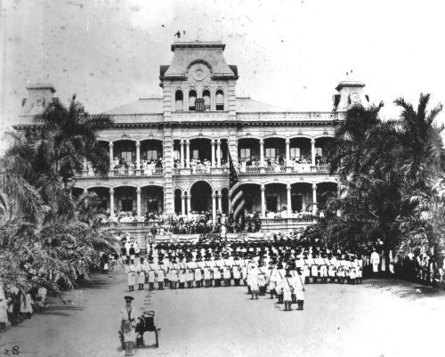Raising American Flag at United States Annexation Ceremony at ‘Iolani Palace, Honolulu, Hawai‘i. August 12, 1898. Photographer: Frank Davey. Collection: Ray Jerome Baker Collection Call Number: G. & P. Republic of Hawaii. Annexation. 1898. F2. Image from Bishop Museum Archives, Honolulu, Hawaii. Images are not to be re-used without permission.