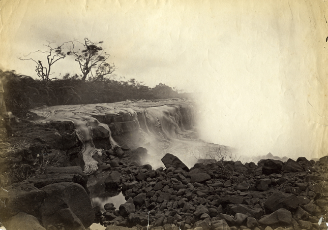 1881 Mauna Loa flow threatening the town of Hilo, Hawai‘i. Photo by L.B. Mayson. Call Number: Sciences. Volcanology. Lava Flows. Mauna Loa Flow 1881. Artifact Number: CP 128264 Accession Number: 1973.264.13 Location: Bishop Museum Archives Image from Bishop Museum Archives, Honolulu, Hawaii. Images are not to be re-used without permission.