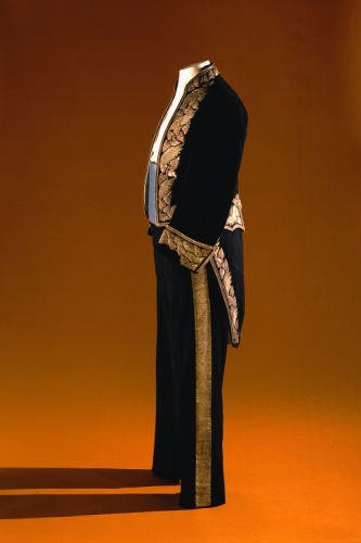 Court Uniform of Col. Curtis P. Iaukea, made for Queen Victoria's Jubilee, 1887. Wool, cotton, silk, silver braid, brass. Photographer: Seth Joel From: Rose, Roger. "Hawai‘i: The Royal Isles." Honolulu: Bishop Museum Press, 1980, page 48, no. 273. Artifact Number: B. 1818 Accession Number: 1919 (B.1818) Location: Bishop Museum Image from Bishop Museum Archives, Honolulu, Hawaii. Images are not to be re-used without permission.