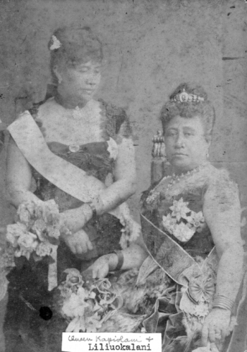 Princess Lili‘uokalani (standing) and Queen Kapi‘olani in London, England, for Queen Victoria's Jubilee, 1887. Photograph by Walery. Call Number: People. Kapiolani. Queen Victoria's Jubilee 1887. Image from Bishop Museum Archives, Honolulu, Hawaii. Images are not to be re-used without permission.