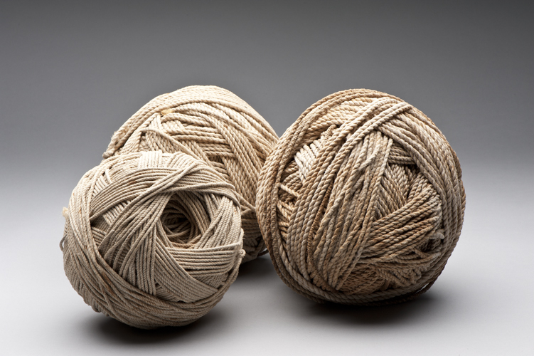 Three balls of olonā cordage; Hawai‘i. [Artifact no. 00772, Accession no. 1889.006, J.S. Emerson Collection; Artifact no. B.06853, Accession no. 1923.362, Kapi‘olani-Kalaniana‘ole Collection; Artifact no. B.06854, Accession no. 1923.362, Kapi‘olani-Kalaniana‘ole Collection, Bishop Museum]. Photo by David Franzen, June 13, 2011. Collection: J.S. Emerson Collection, Kapi‘olani-Kalaniana‘ole Collec Call Number: Q 205658 Artifact Number: 00772, B.06853, B.06854 Accession Number: 1889.006, 1923.362, 1923.362 Image from Bishop Museum Archives, Honolulu, Hawaii. Images are not to be re-used without permission.