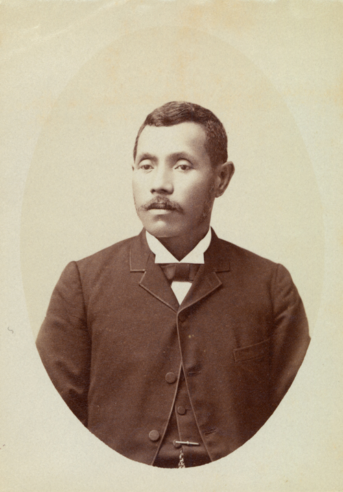 Editor Ke Aloha Aina 1895 - 1896 As a lawyer and legislator from the Puna District of Hawai‘i Island, Joseph Nāwahī served his nation as a determined and well-respected leader. His eloquent and thoughtful critiques delivered within the legislature were not reserved only for the common target of foreign influence, but could just as pointedly highlight what he saw as the poor governmental policy of his King. Nāwahī founded a Hawaiian-language newspaper with his wife Emma, Ke Aloha Aina, which came to serve as a site of political dialogue and organization after the overthrow of January 1893. The paper fiercely challenged the legitimacy of the new government despite new censorship laws and the harassment of newspaper editors during the period. Joseph died in 1896 of tuberculosis thought to have been contracted during time spent in prison on a charge of treason. His wife Emma ran the paper – often publishing messages from the Queen to her people - with diligence and grace after his death. Call Number: SP 77056 Image from Bishop Museum Archives, Honolulu, Hawaii. Images are not to be re-used without permission.